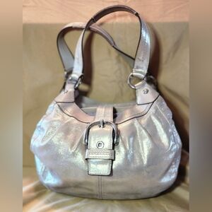 Coach Soho Lynn medium metallic gold shoulder bag.